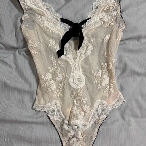 Elegant Lace Bodysuit with Black Bow